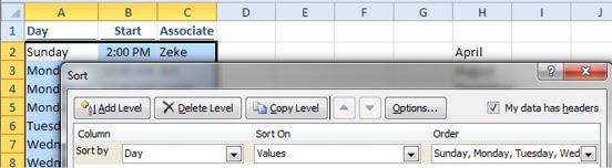 Using the Order dro-down menu in the Sort dialog, choose Custom List, and then choose the built-in list with Sunday, Monday, Tuesday...