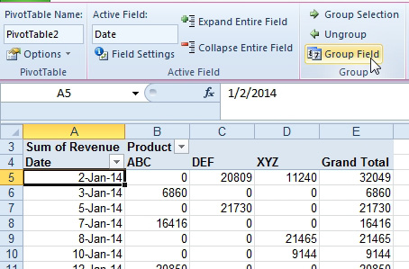 From the first date cell in the pivot table, choose Group Field from the Analyze tab in the ribbon.