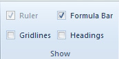 On the View tab, there is a Show group. Turn off Gridlines and Headings. Keep Formula Bar selected. 